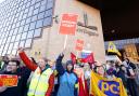 Members of the PCS union on the picket line outside the Passport Office in Glasgow.