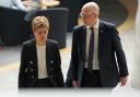 Nicola Sturgeon faced questions from the media at Holyrood with her former deputy John Swinney alongside her