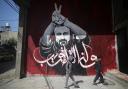 A big mural shows jailed Fatah leader Marwan Barghouti, in Jabalia refugee camp in the northern Gaza Strip