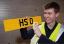 The HS 0 number plate is shown by an East Renfreshire Council worker