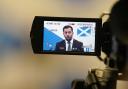 Humza Yousaf delivers a speech at the University of Glasgow