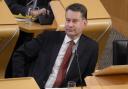 Tory MSP Murdo Fraser has threatened the police with legal action