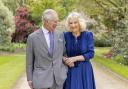 King Charles III and Queen Camilla, taken by portrait photographer Millie Pilkington, in Buckingham Palace Gardens on April 10