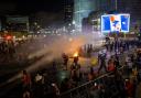 Israeli police used a water cannon to disperse demonstrators during a protest in Tel Aviv