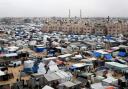 A tent camp housing Palestinians displaced by the Israeli offensive (Hatem Ali/AP)
