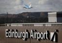 Edinburgh Airport said the IT outage is causing longer waiting times as the computer error has caused departure screens to malfunction