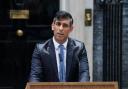 Prime Minister Rishi Sunak issuing a statement outside 10 Downing Street