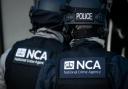 Archive image of officers with the National Crime Agency