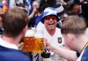 Scotland and Germany fans enjoy a drink at Marienplatz square, Munich.