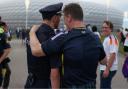 Munich Police shared a photo of a Scotland fan with their arm around an officer