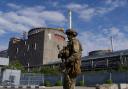 A Russian serviceman guards an area of the Zaporizhzhia nuclear power station