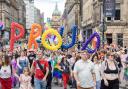 People take part in the Pride Edinburgh 2023 parade through Edinburgh city centre.