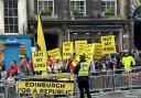 Protesters held a demonstration against the monarchy as the King and Queen visited Edinburgh