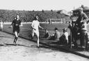 Olympic champion Eric Liddell, winning a race at Ibrox Park, Glasgow