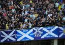 Scotland fans celebrate at the Cologne Stadium during their Euros match against Switzerland