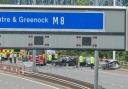 Two police officers were involved in a serious three-car-crash on the M8 in Glasgow shortly after 1pm on July 24