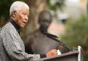 Former South African President Nelson Mandela addresses the crowd during a statue unveiling ceremony in his honour at Parliament Square, London