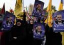 Iranian protesters attend a demonstration to condemn the killing of Hamas leader Ismail Haniyeh