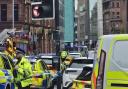 Police officers were called to a report of a woman being struck by a car on Wellington Lane at about 2.40pm on Tuesday