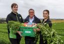 Asda Huntly produce colleague Rhys McWilliam, owner of Benzies Produce Philip Benzies and Asda Hunty section leader Rebecca MacDougall