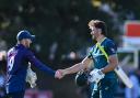 Marcus Stoinis and Matt Cross shake hands at the end of Australia's comprehensive win