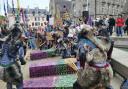 Hundreds of people gathered outside Holyrood on Thursday afternoon to protest against cuts to Scotland's culture budget