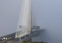 A contrast in weather created by the better temperatures formed a wall of fog in the middle of the bridge