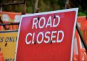 A Scottish road has remained closed after a vehicle caught fire