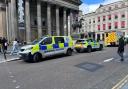 The force rushed to the scene after a man fell from a balcony inside a Glasgow art gallery