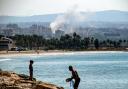 A cloud of smoke erupts during Israeli air strikes on a village south of Tyre in southern Lebanon