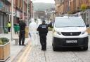 A 21-year-old man was found injured in a street on Saturday