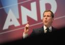 Robert Jenrick delivers a speech during the Conservative Party Conference in Birmingham