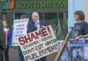 Protesters stood outside Scottish Power this week over the cut to the Winter Fuel Payment