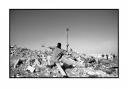 Palestinian uses slingshot against Israeli troops -West Bank. Intifada - war of the stones All Pics Â© David Pratt.