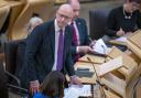 First Minister of Scotland John Swinney during First Minister's Questions at the Scottish Parliament