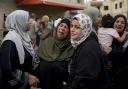 Palestinians mourn for a relative killed in the Israeli bombardment of the Gaza Strip