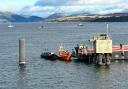 Helensburgh's RNLI lifeboat was seen along with a police RIB at one of Western Ferries' linkspans at McInroy's Point.