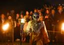 Members of the Beltane Fire Society take part in Samhuinn Fire Festival on October 31 in Edinburgh