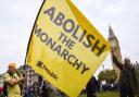 Protesters hold an 'abolish the monarchy' banner as anti-monarchy group Republic stage a protest in Parliament Square on Budget Day