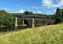 The bridge carries people across the Tweed