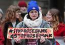 Climate activists from Greenpeace and Uplift during a demonstration outside the Scottish Court of Session, Edinburgh, on the first day of the Rosebank and Jackdaw judicial review hearing