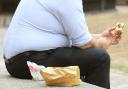 A man eating fast food