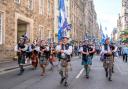 People take part in a Believe in Scotland march and rally in Edinburgh in 2023