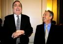 John Prescott, left, enjoying a laugh with Sir Tony Blair (Andrew Parsons/PA)