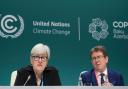 Rachel Kyte, UK climate envoy, and Albert Rosti, of Switzerland, attend a session on climate targets at Cop29 (AP Photo/Sergei Grits/PA)