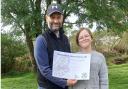 Ian and Eve with their NatureScot certificate for completing all 29 of Scotland’s Great Trails