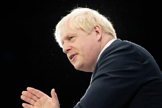 The National: Prime Minister Boris Johnson gestures
