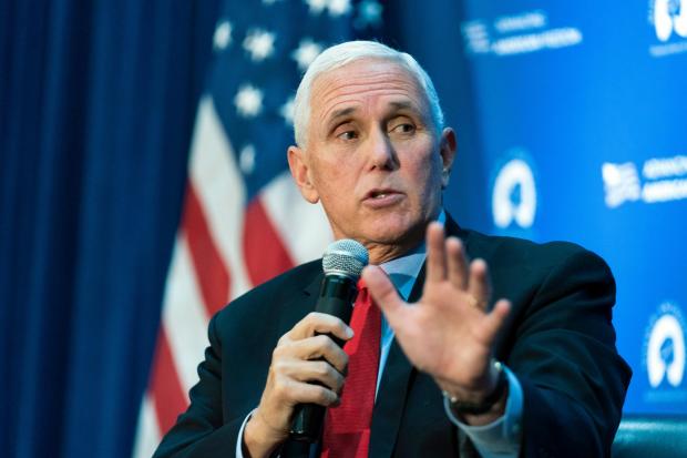 The National: Former US vice president Mike Pence gestures while speaking about abortion