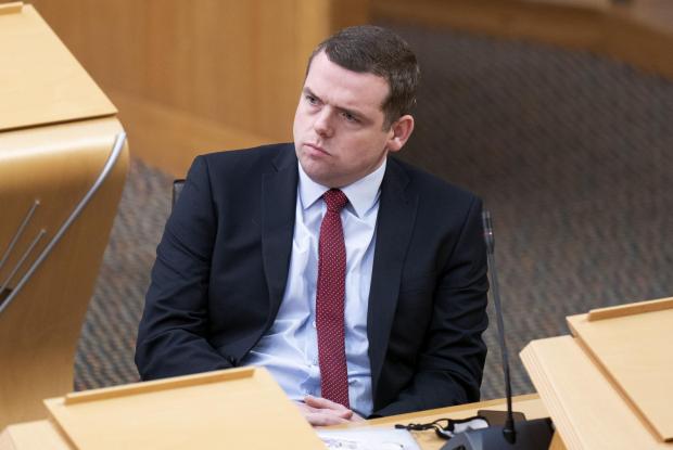 The National: Scottish Conservative leader Douglas Ross as First Minister Nicola Sturgeon delivers a Covid-19 update statement on the Omicron variant at the Scottish Parliament, Edinburgh. Picture date: Tuesday November 30, 2021. PA Photo. See PA story HEALTH