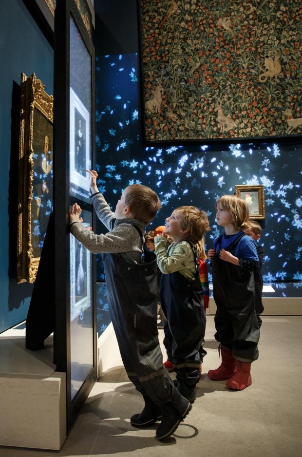 The National: Pictured are Children from the Woodland Outdoor Kindergarten looking at a new interactive digital display